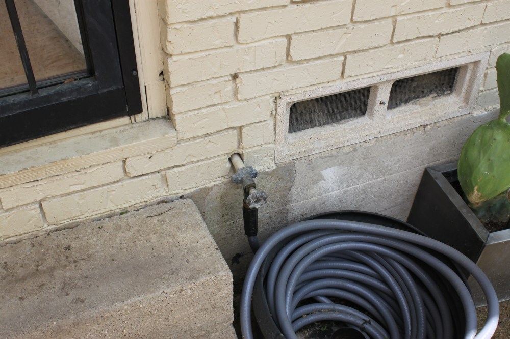 Old Outdoor Faucet Next to the Back Door
