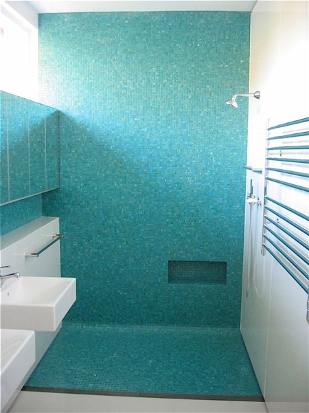 Tiny Turquoise Tile in Frameless Shower