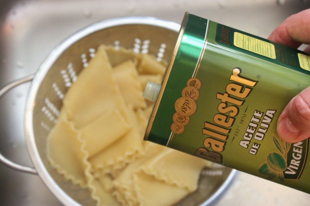 Toss the Hot Noodles with a Few Tablespoons of Olive Oil