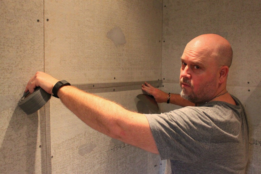 Jamie Used Black Mesh Tape to Tape the Seam of the Concrete Board