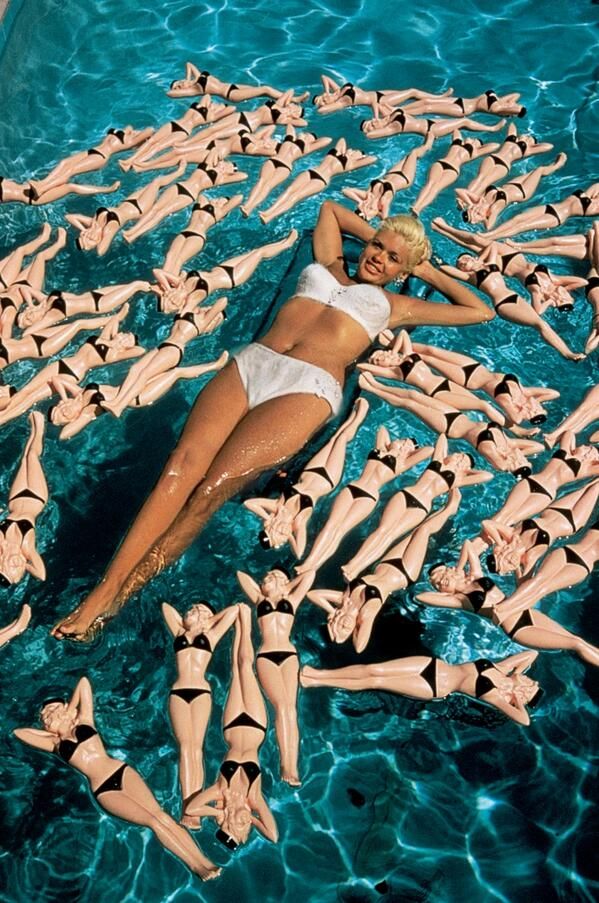 Jayne Mansfield Floating in her Pool with Water Bottles in her Image