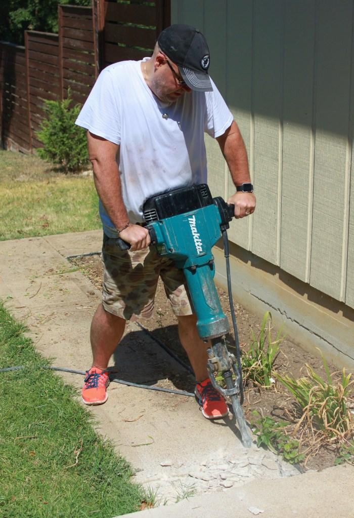 Jamie and the Jackhammer in the Cavender Backyard