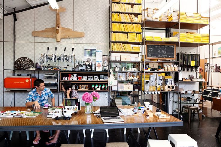 Workspace with Stacks of National Geographics for Inspiration