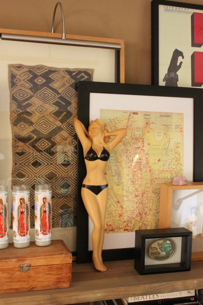 Jayne Mansfield Water Bottle Relaxing on the Book Shelves