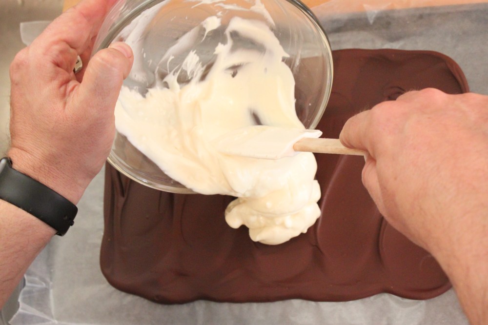 Pour the White Chocolate Over the Cooled Chocolate