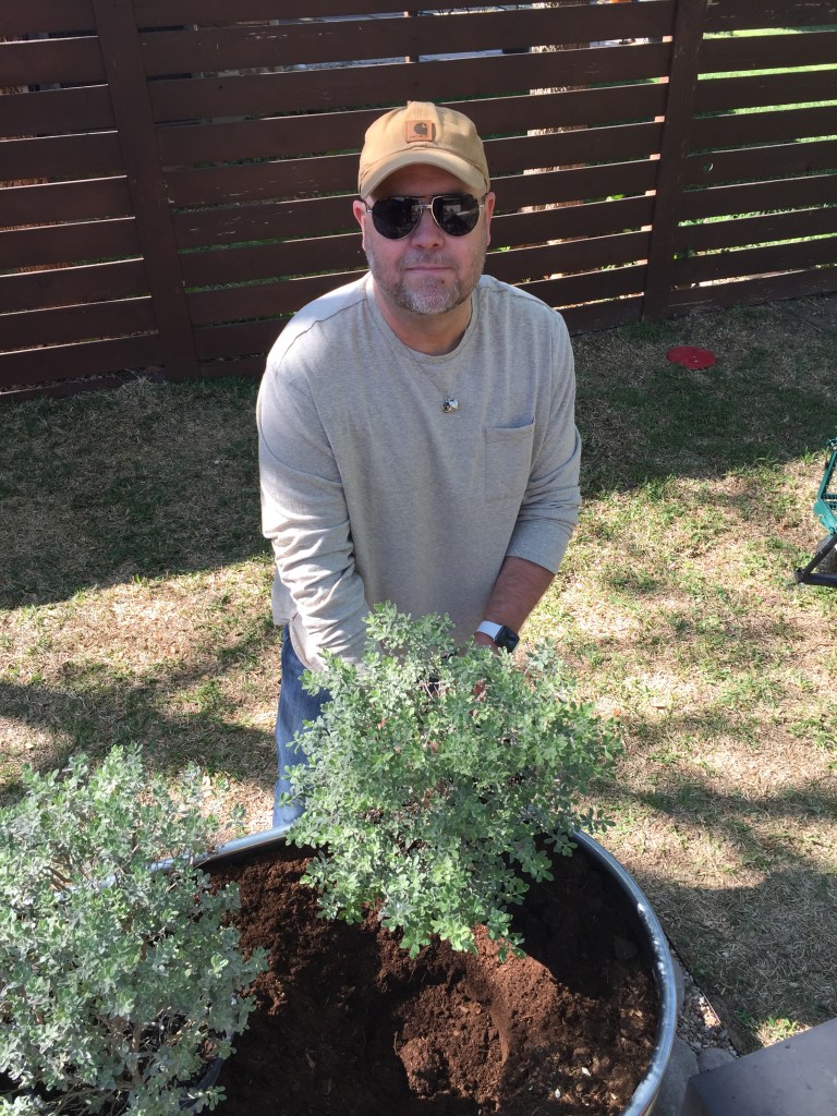 Jamie Planting Desert Sage in the Horse Troughs