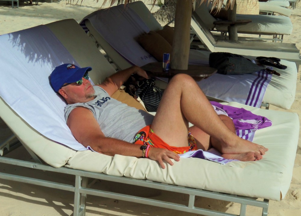 Jamie Relaxing on a Bali Bed by the Ocean