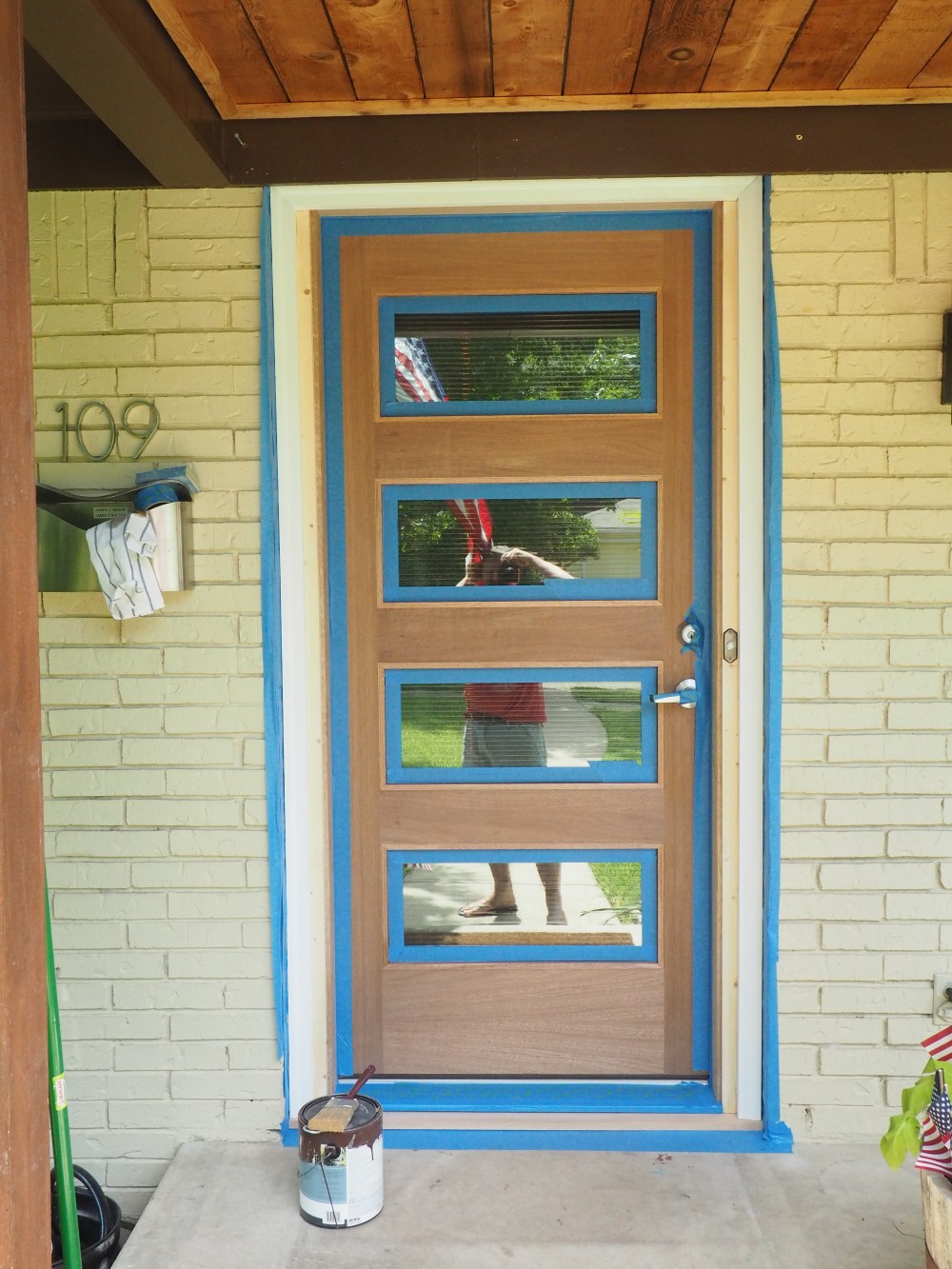 Modern Door with Blue Tape on Trim