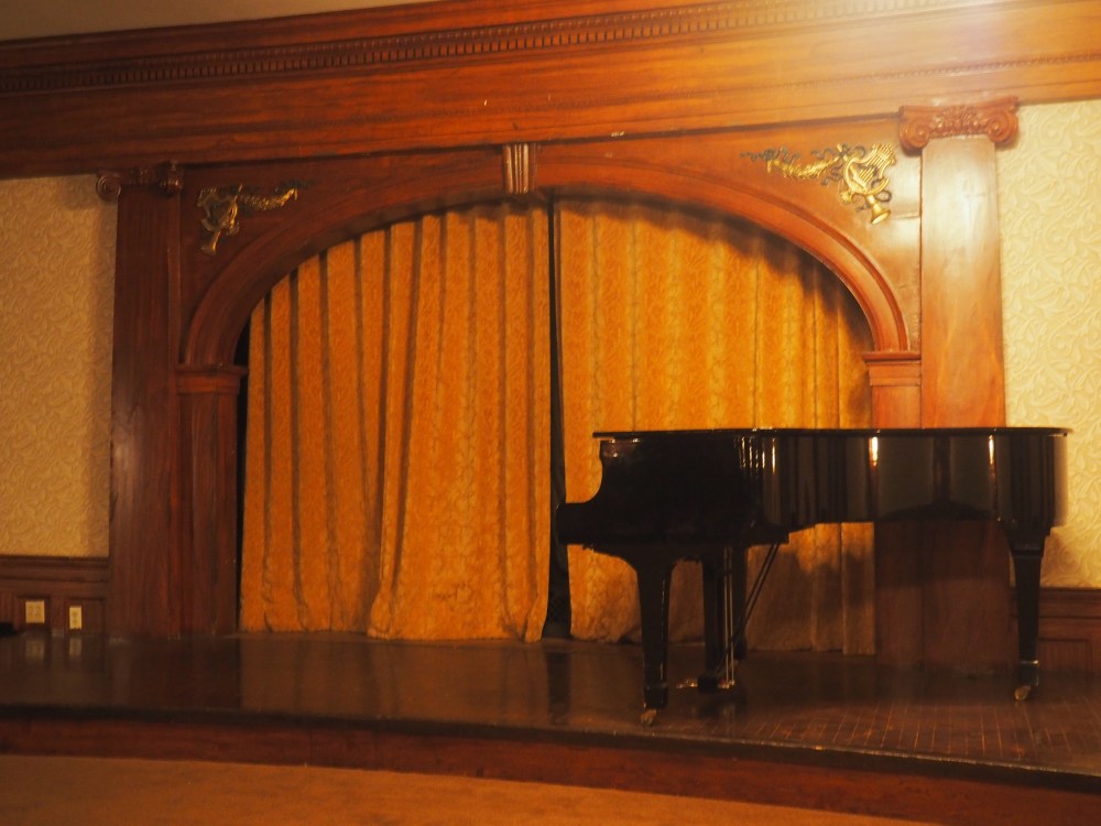 piano-and-stage-in-the-grand-ballroom-of-the-stanley-hotel