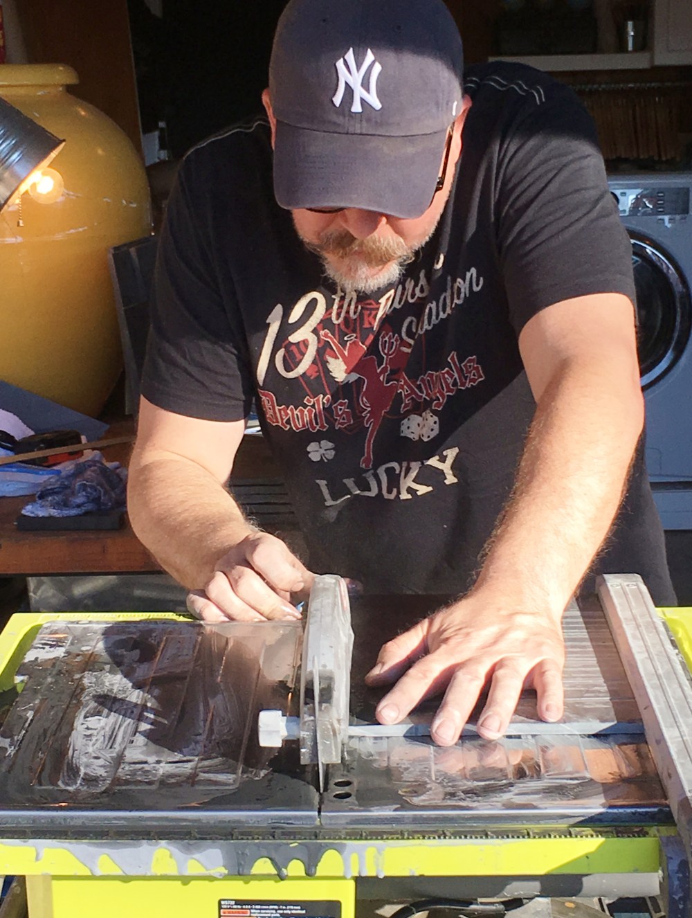 james-cutting-the-slate-floor-tile