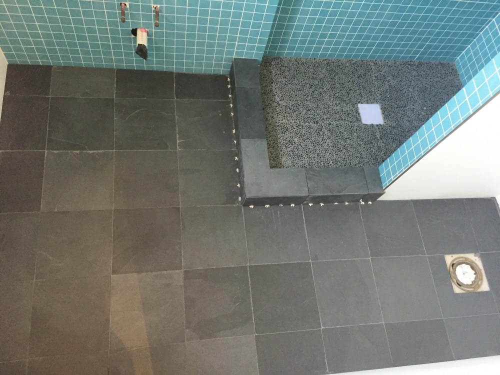 slate-floor-and-shower-edge-in-the-master-bathroom