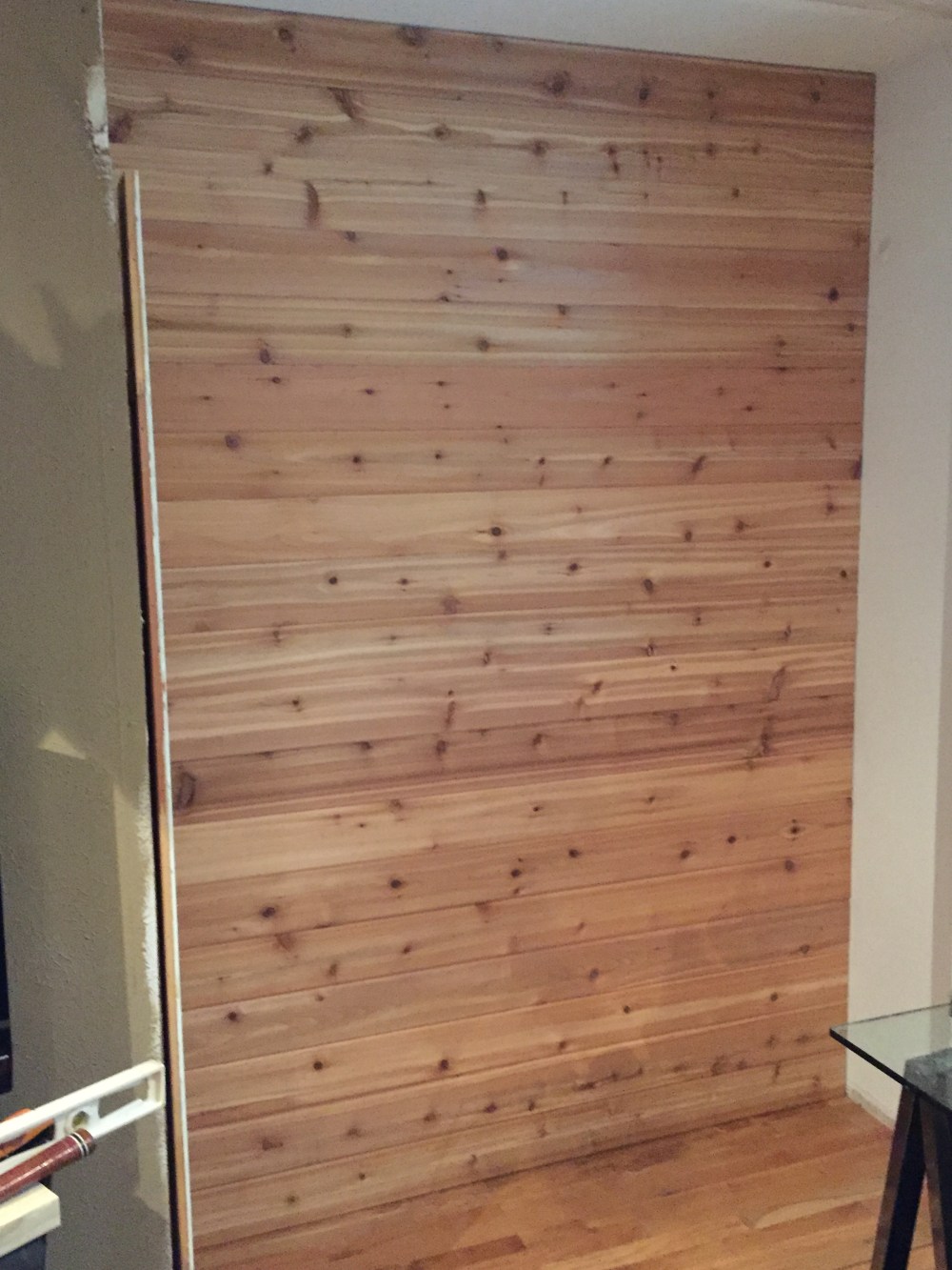 Finished Cedar Wall in the Master Bedroom Closet