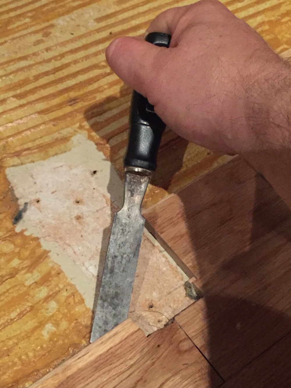 I Used a Wedge to Pry Up the Old Floor Boards