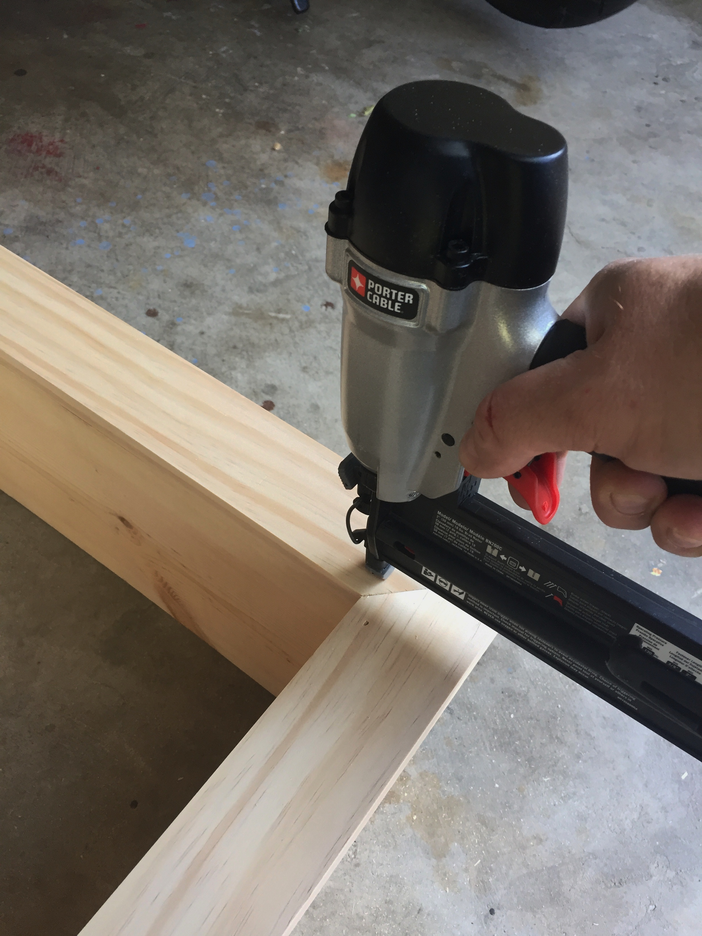Use a brad Nailer to Attach the Top Trim