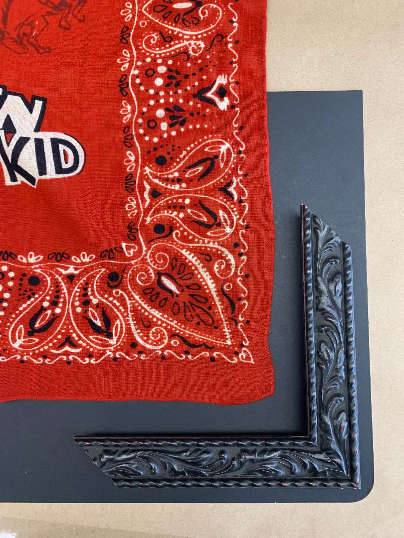 black mat under the bandanna