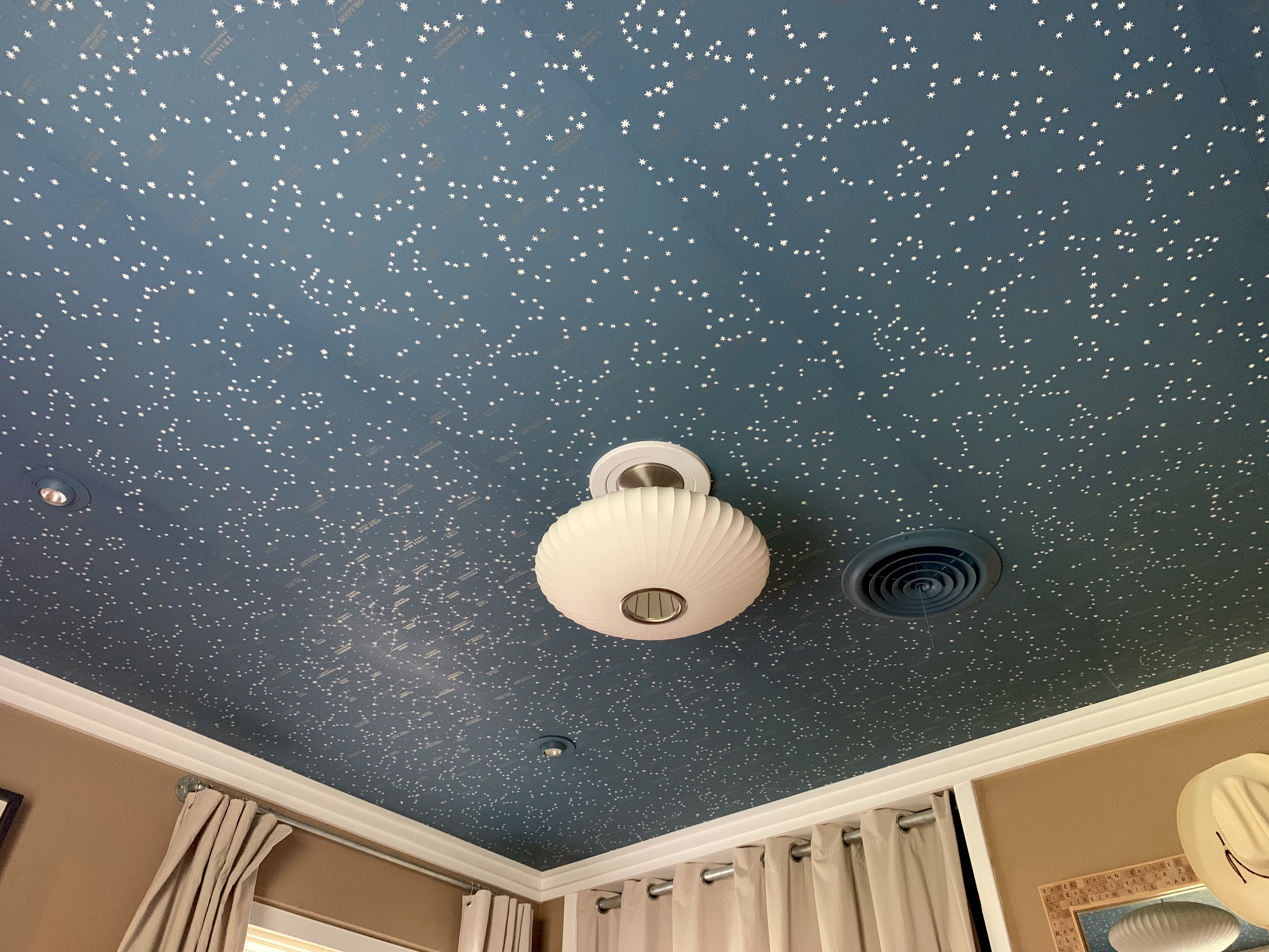 Corner Shot of Ralph Lauren Northern Hemisphere Wallpaper on the Ceiling