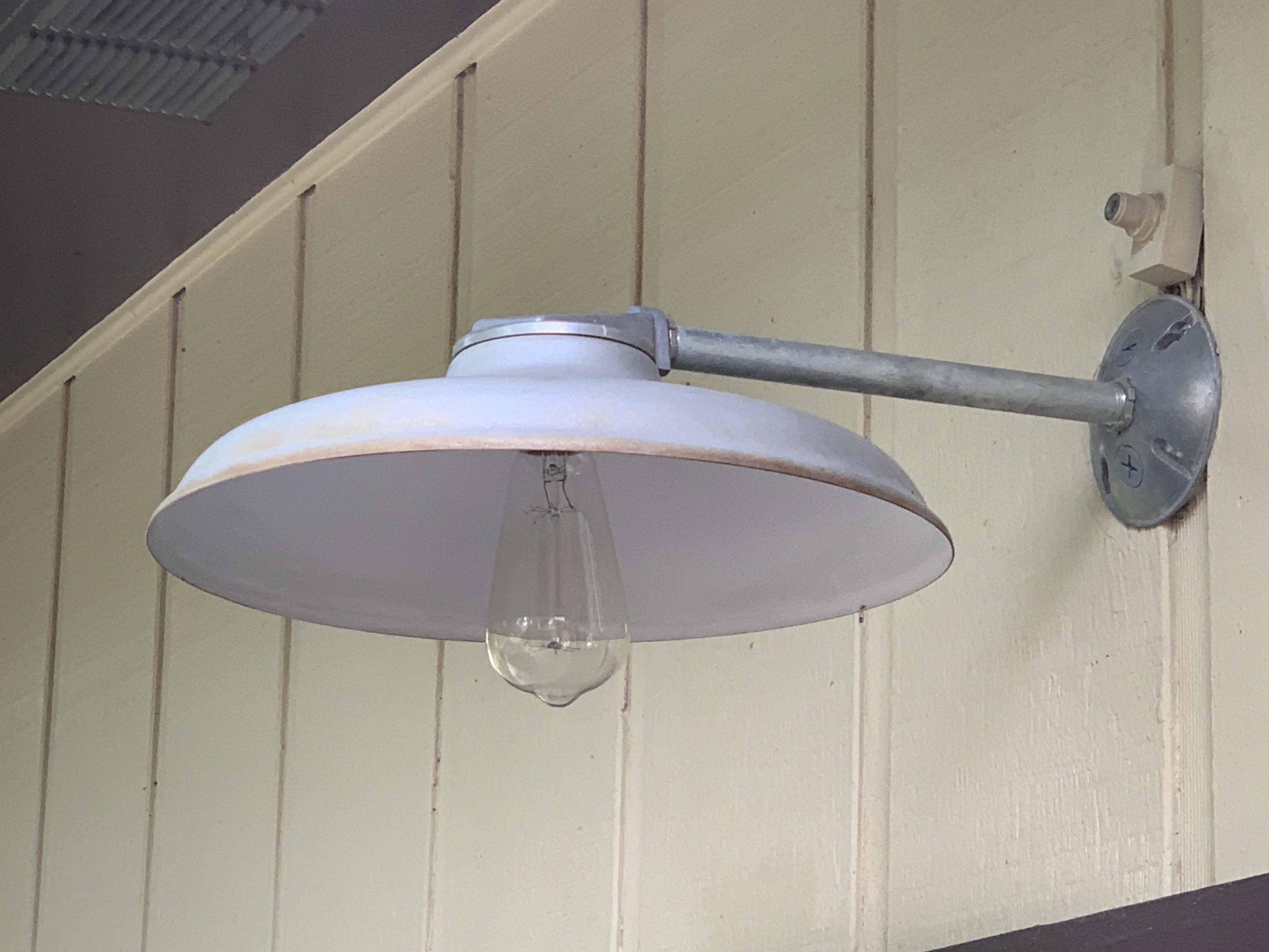 Old Silver Barn Light Over the Garage Door 